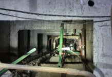 «Приходится подниматься на 20 этаж»: как Николаевские коммунальщики помогают возвращать тепло в дома киевлян, — ФОТО