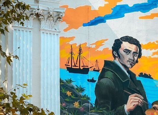 Молодой Шевченко и разбитые цепи: в Николаеве появился новый мурал